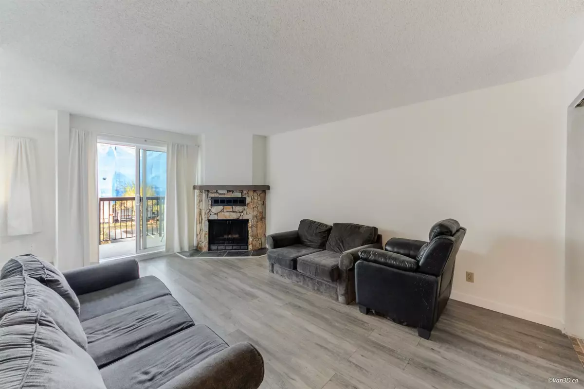 Family Room Photo of 203 7162 133a Street, Surrey, BC