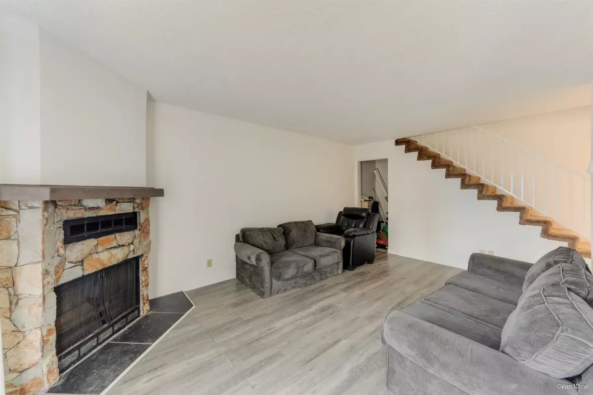 Living Room Photo of 203 7162 133a Street, Surrey, BC