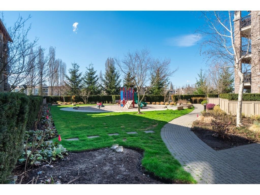 Family Room Photo of 402 5655 210a Street, Langley, BC