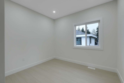 Basement Recreation Room Photo of 101 13661 59 Avenue, Surrey, BC
