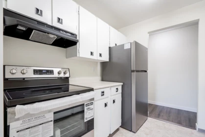 Walk-In Closet Photo of 304 33850 Fern Street, Abbotsford, BC