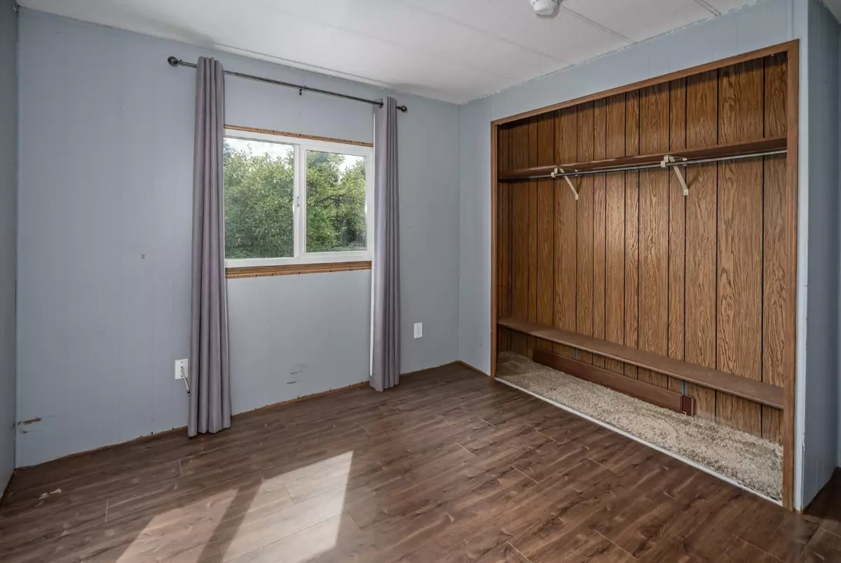 Living Room Photo of 1 11812 Ponderosa Boulevard, Pitt Meadows, BC