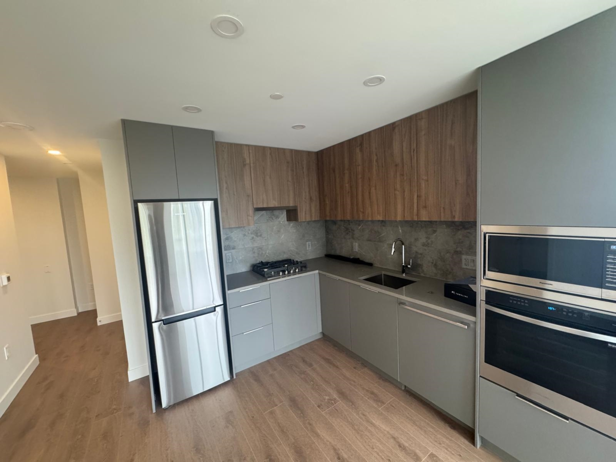 Living Room Photo of 502 13387 Old Yale Road, Surrey, BC