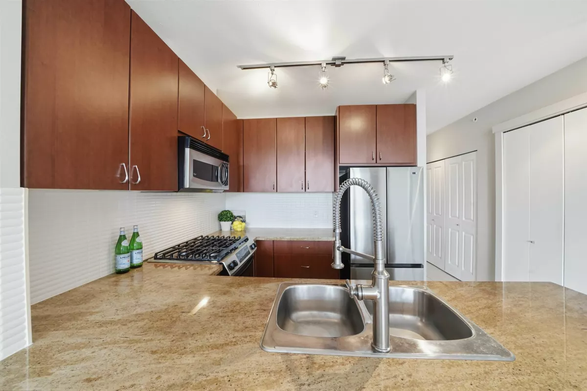 Family Room Photo of 1107 9266 University Crescent, Burnaby, BC