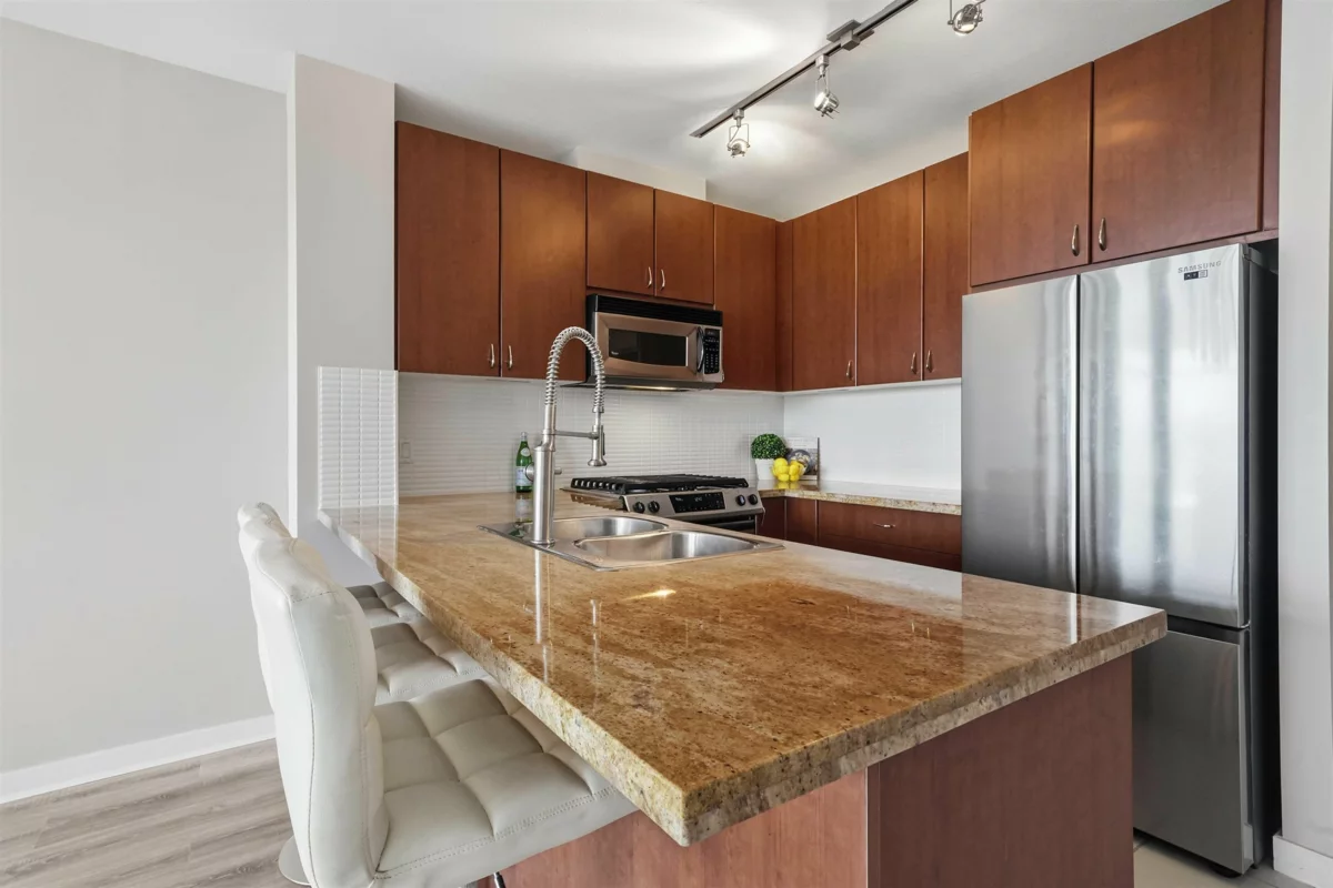 Living Room Photo of 1107 9266 University Crescent, Burnaby, BC