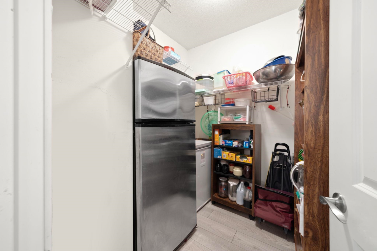 Laundry Room Photo of 309 15388 101 Avenue, Surrey, BC