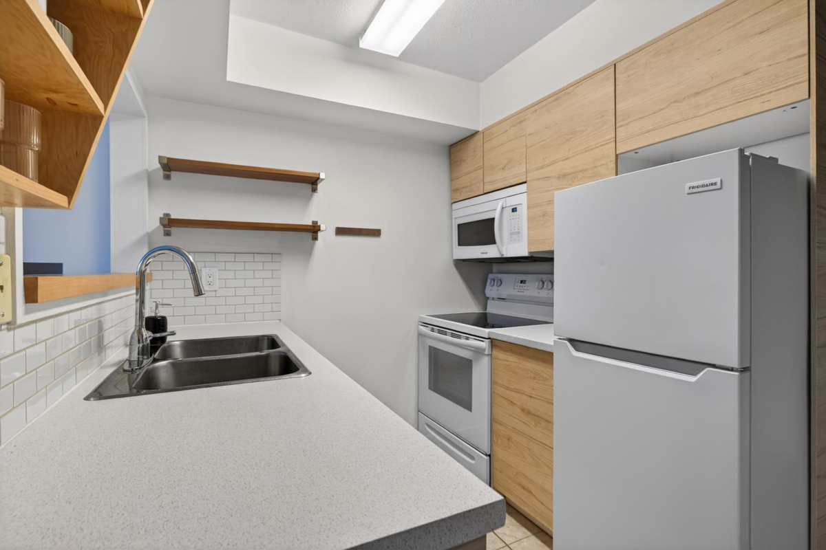 Living Room Photo of 310 1099 E Broadway, Vancouver, BC