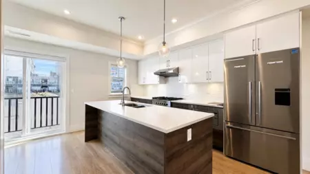 Living Room Photo of 12 9211 Mckim Way, Richmond, BC