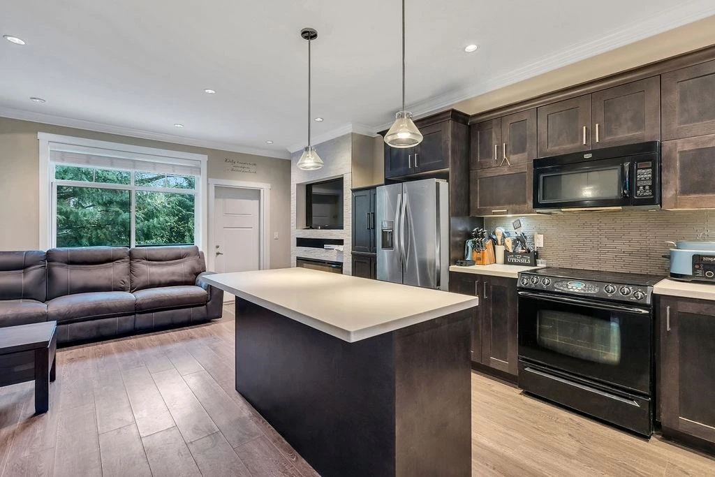 Living Room Photo of 20 7090 180 Street, Surrey, BC