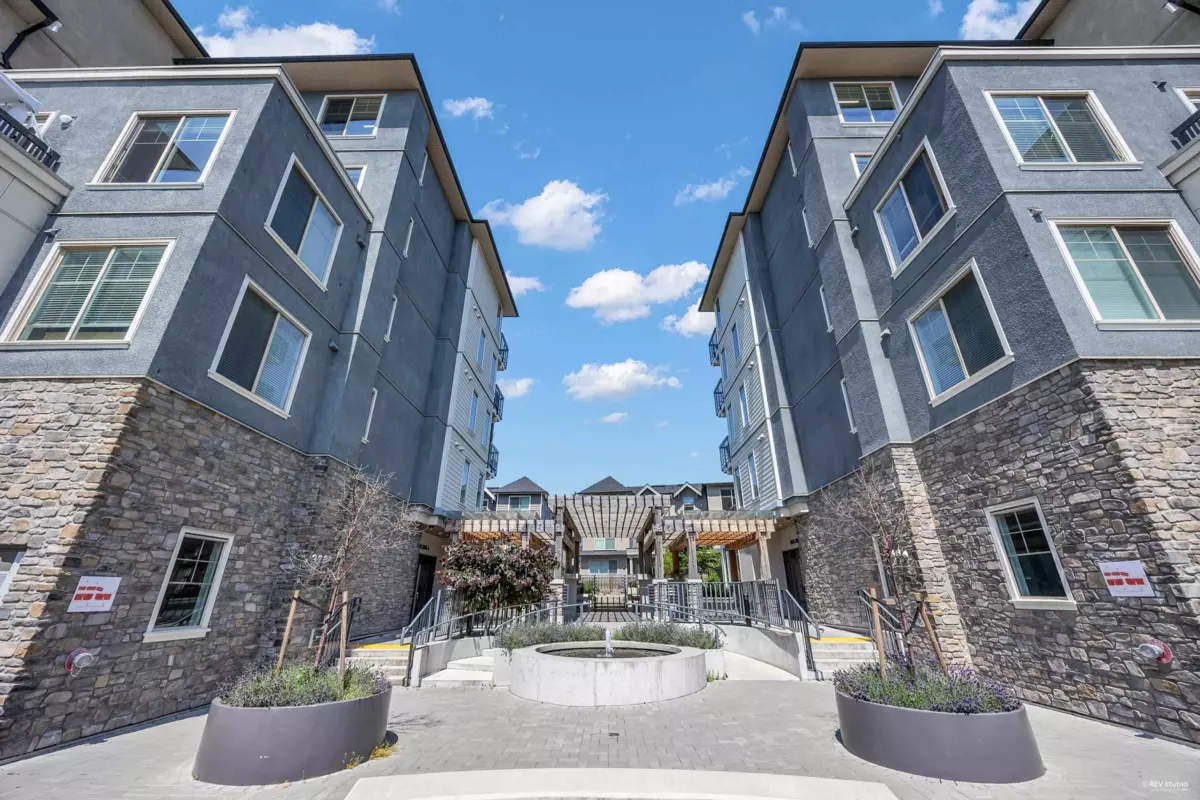 Exterior Rear Photo of A303 20487 65 Avenue, Langley, BC