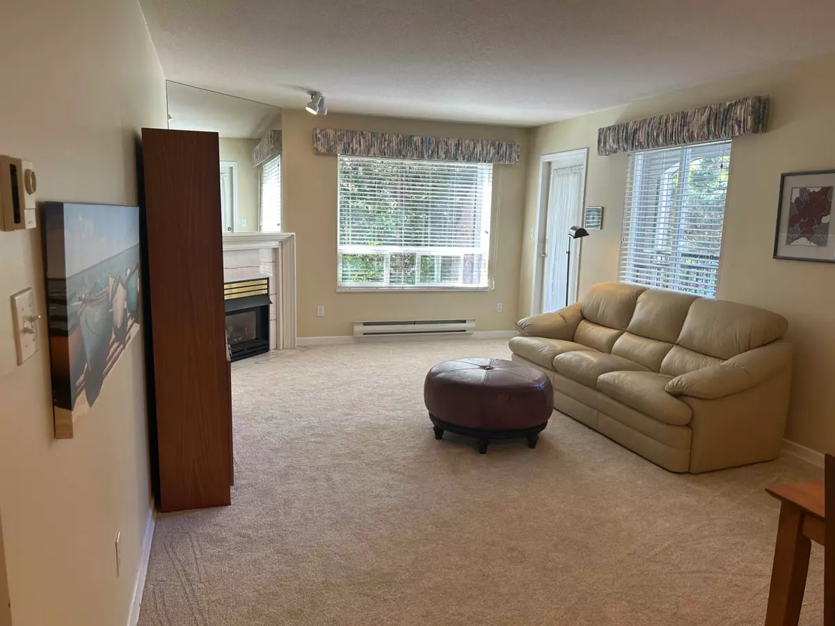 Living Room Photo of 204 1533 Best Street, White Rock, BC