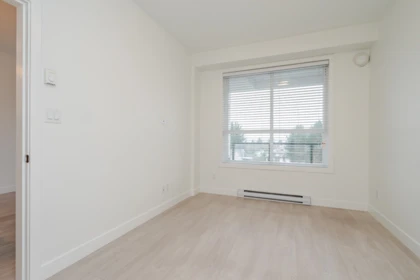 Laundry Room Photo of 404 19567 64 Avenue, Surrey, BC