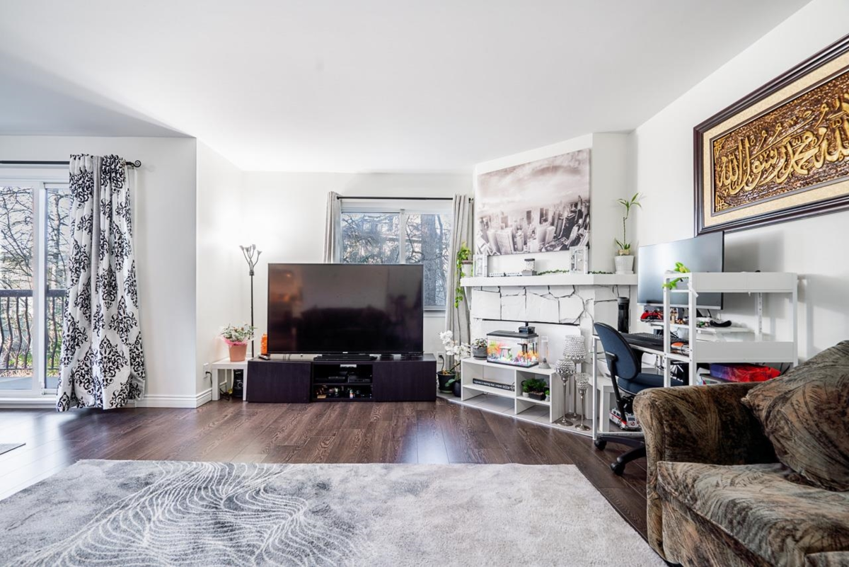 Family Room Photo of 201 13283 70b Avenue, Surrey, BC