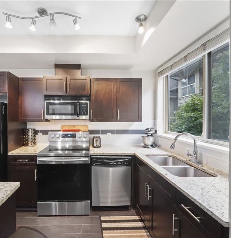 Living Room Photo of 228 2108 Rowland Street, Port Coquitlam, BC