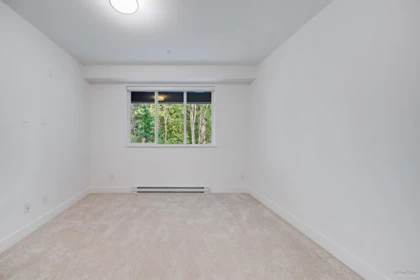Laundry Room Photo of 303 3480 146a Street, Surrey, BC