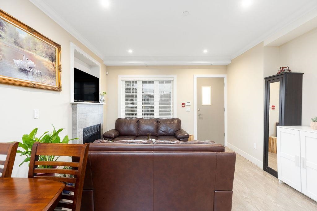 Family Room Photo of 201 4577 Slocan Street, Vancouver, BC