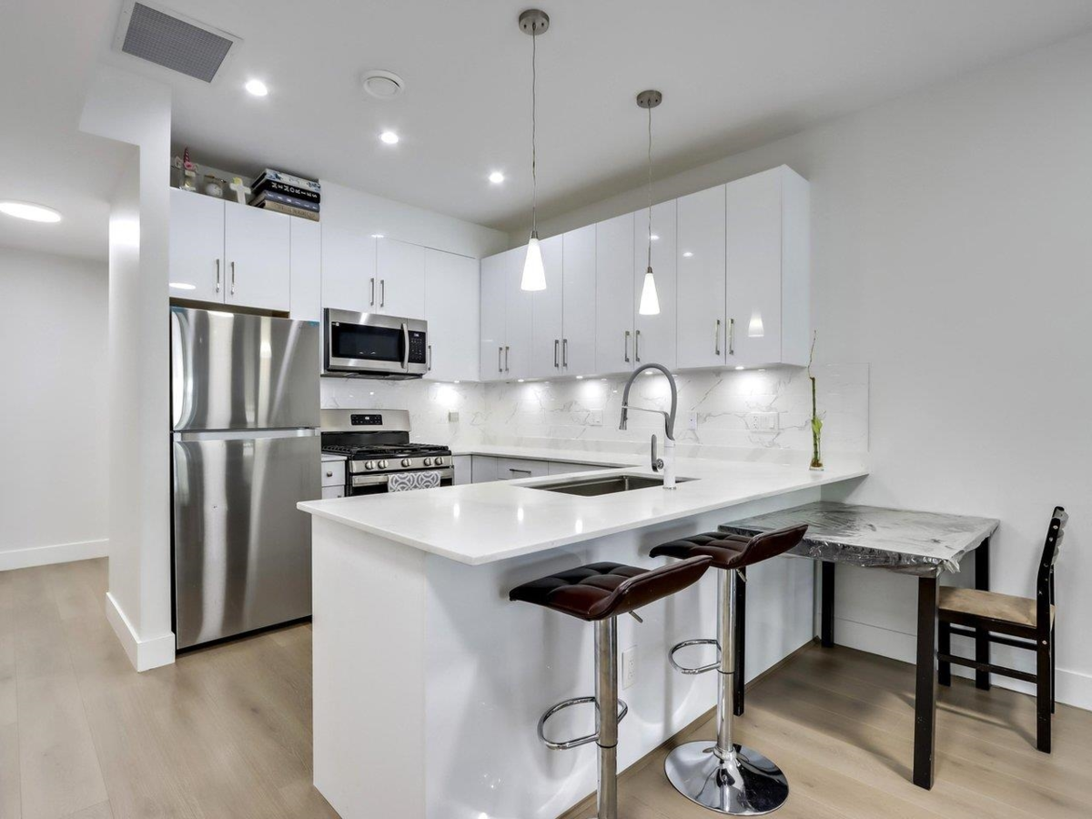 Exterior Rear Photo of 103 906 Quadling Avenue, Coquitlam, BC