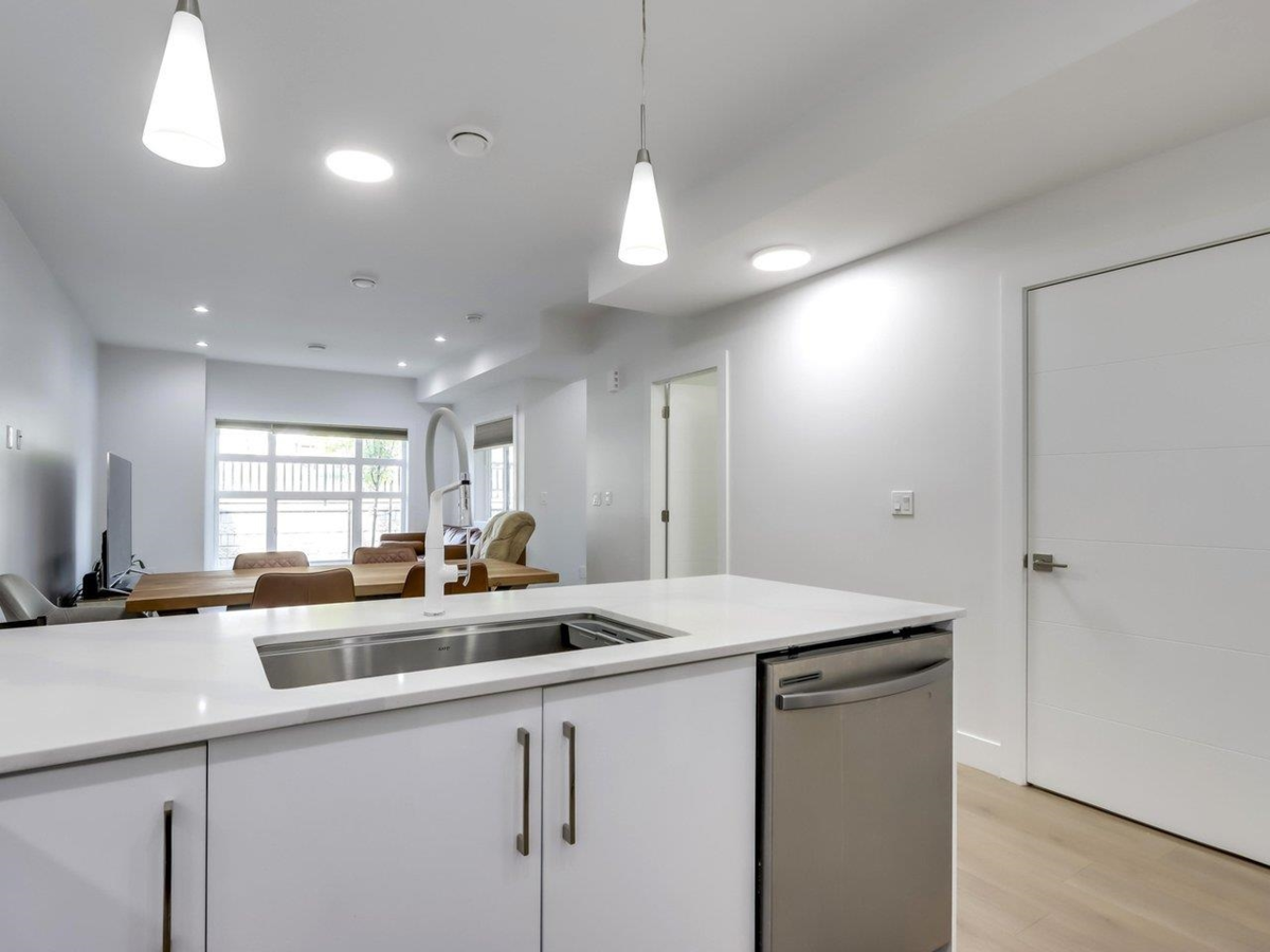 Family Room Photo of 103 906 Quadling Avenue, Coquitlam, BC