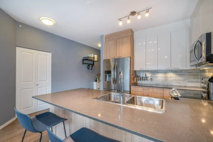 Kitchen Island Photo of 409 210 Lebleu Street, Coquitlam, BC