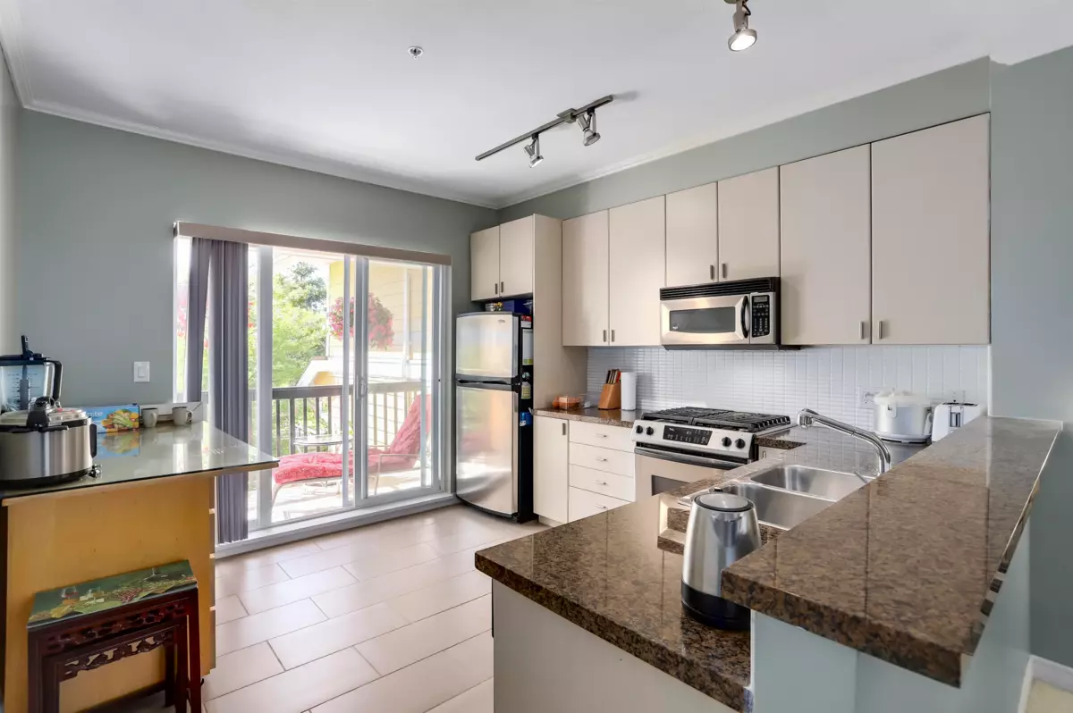 Living Room Photo of 11 6878 Southpoint Drive, Burnaby, BC