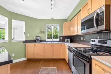 Kitchen Island Photo of 104 32725 George Ferguson Way, Abbotsford, BC