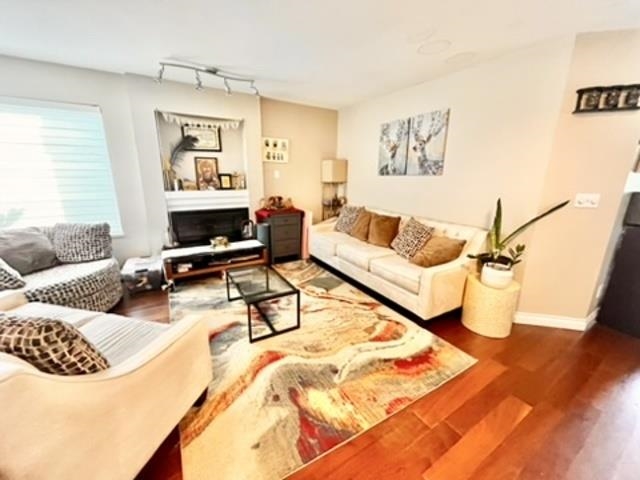 Family Room Photo of 208 13900 Hyland Road, Surrey, BC