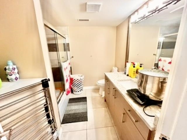 Laundry Room Photo of 208 13900 Hyland Road, Surrey, BC