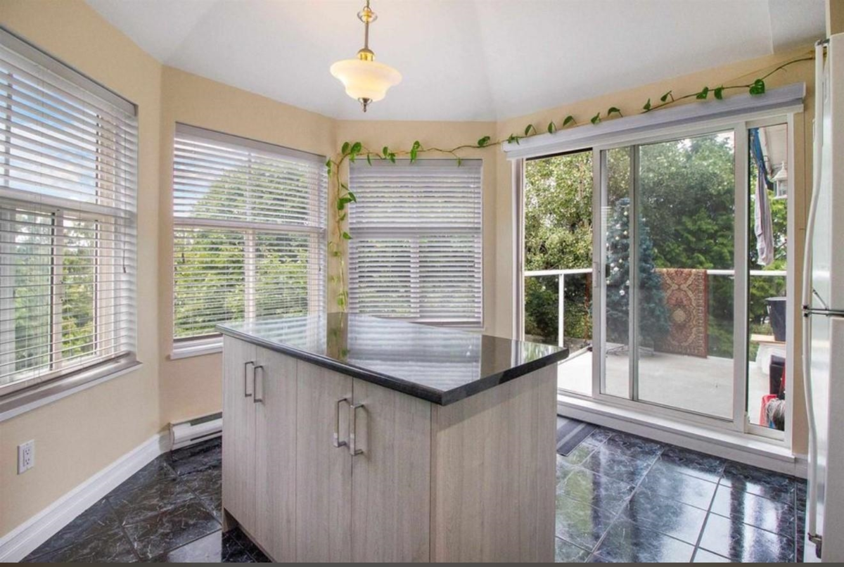 Kitchen Island Photo of 401 12739 72 Avenue, Surrey, BC