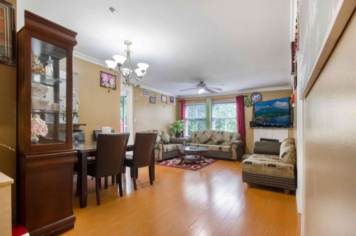 Living Room Photo of 401 12739 72 Avenue, Surrey, BC