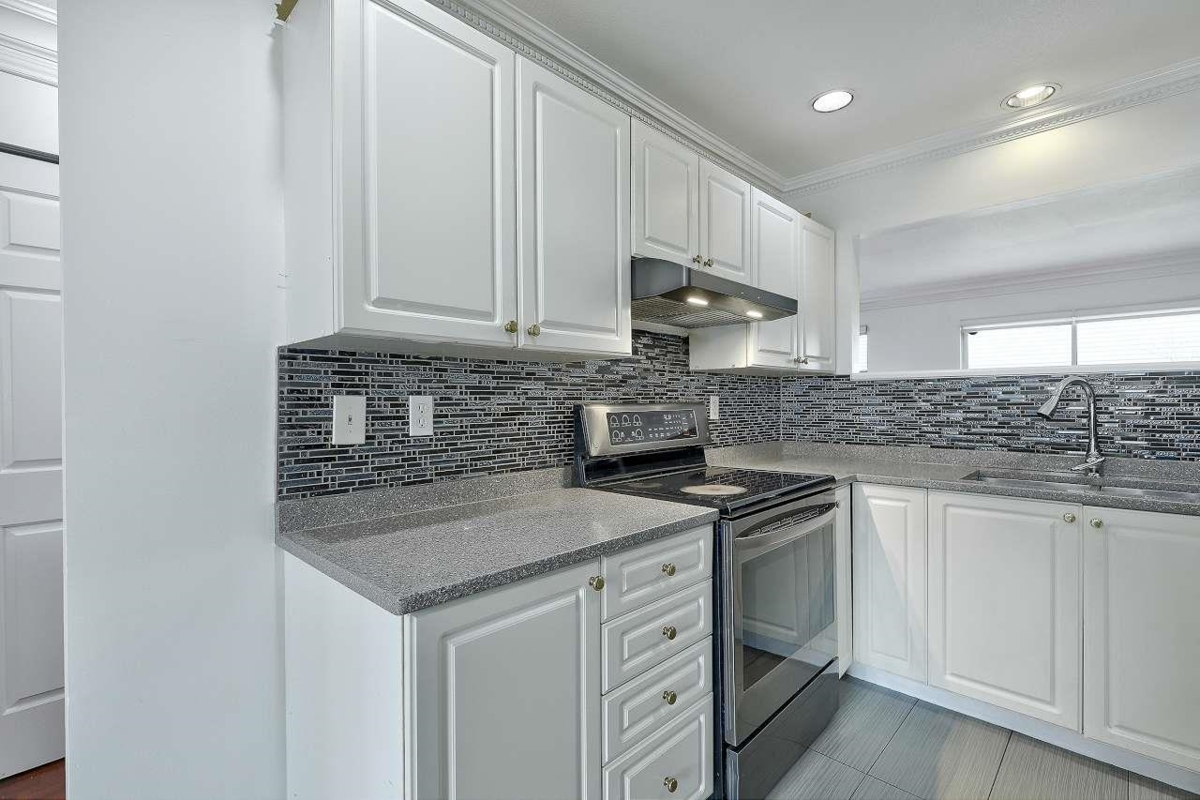 Kitchen Island Photo of 46 10038 155 Street, Surrey, BC