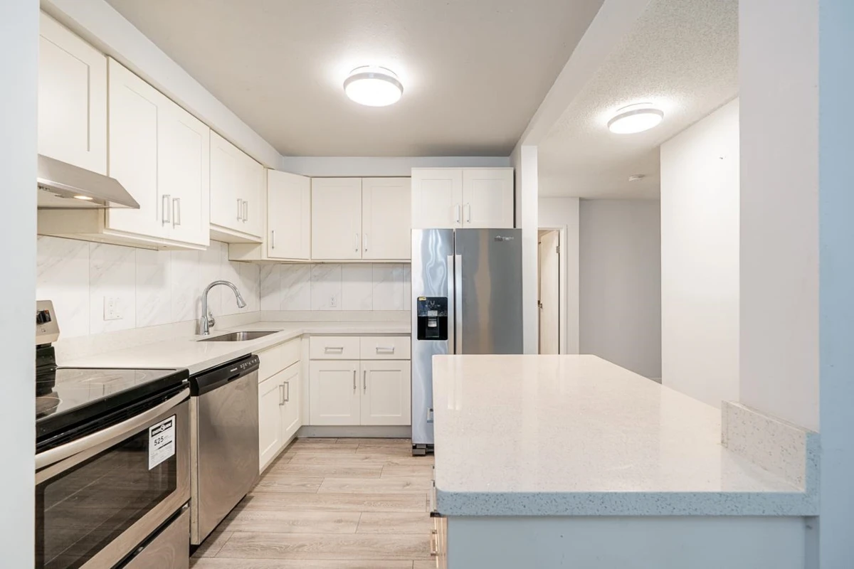 Family Room Photo of 102 6105 Kingsway, Burnaby, BC