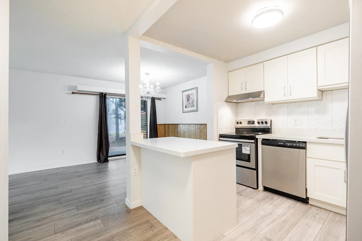 Living Room Photo of 102 6105 Kingsway, Burnaby, BC