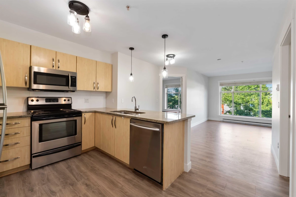 Dining Area Photo of 215 13555 Gateway Drive, Surrey, BC