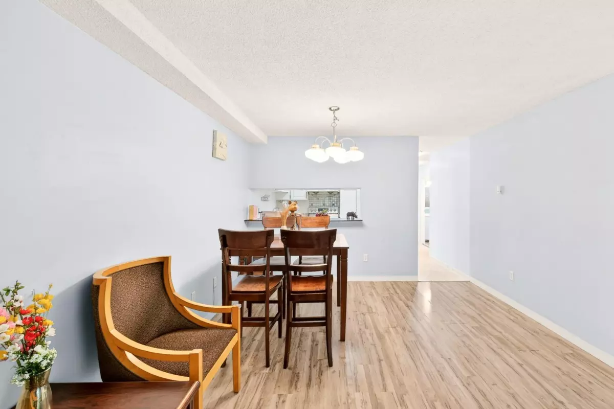 Living Room Photo of 102 8460 Ackroyd Road, Richmond, BC