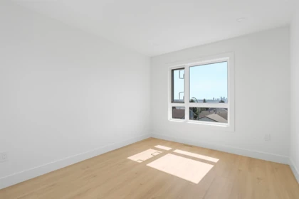Basement Recreation Room Photo of 104 1132 Madore Avenue, Coquitlam, BC