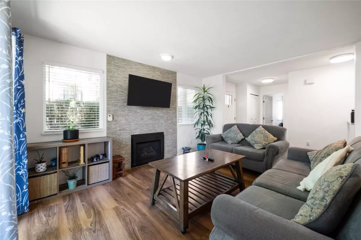 Living Room Photo of 201 8972 Fleetwood Way, Surrey, BC