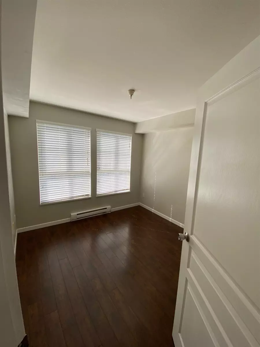 Living Room Photo of 210 6991 Victoria Drive, Vancouver, BC