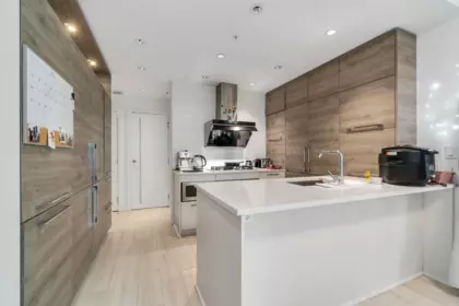 Laundry Room Photo of 402 7388 Kingsway, Burnaby, BC