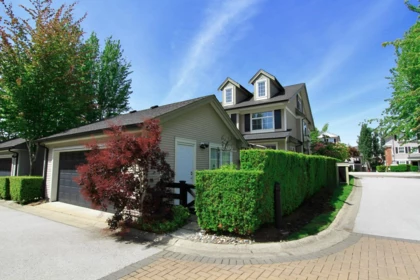 Front exterior of 14 19490 Fraser Way, Pitt Meadows, BC