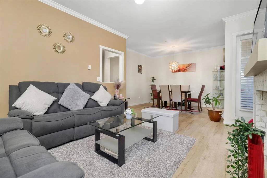 Family Room Photo of 106 10675 138a Street, Surrey, BC