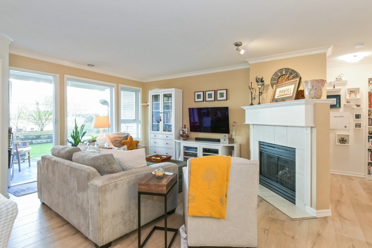 Living Room Photo of 103 17727 58 Avenue, Surrey, BC