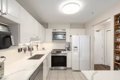 Kitchen Island Photo of 402 2559 Parkview Lane, Port Coquitlam, BC