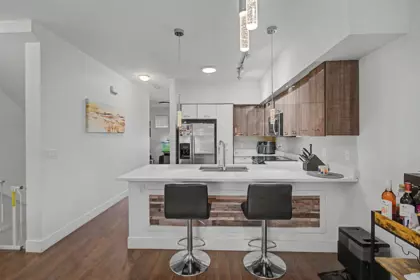Kitchen Island Photo of 100 6299 144 Street, Surrey, BC