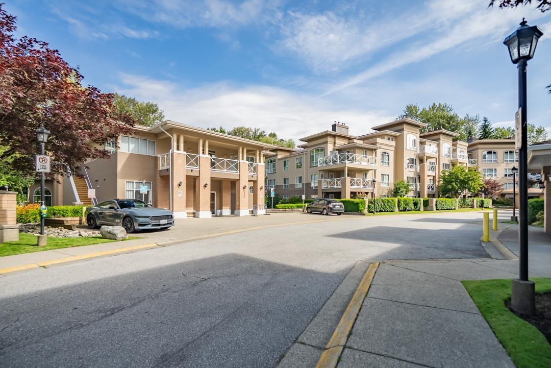Living Room Photo of 308 2551 Parkview Lane, Port Coquitlam, BC