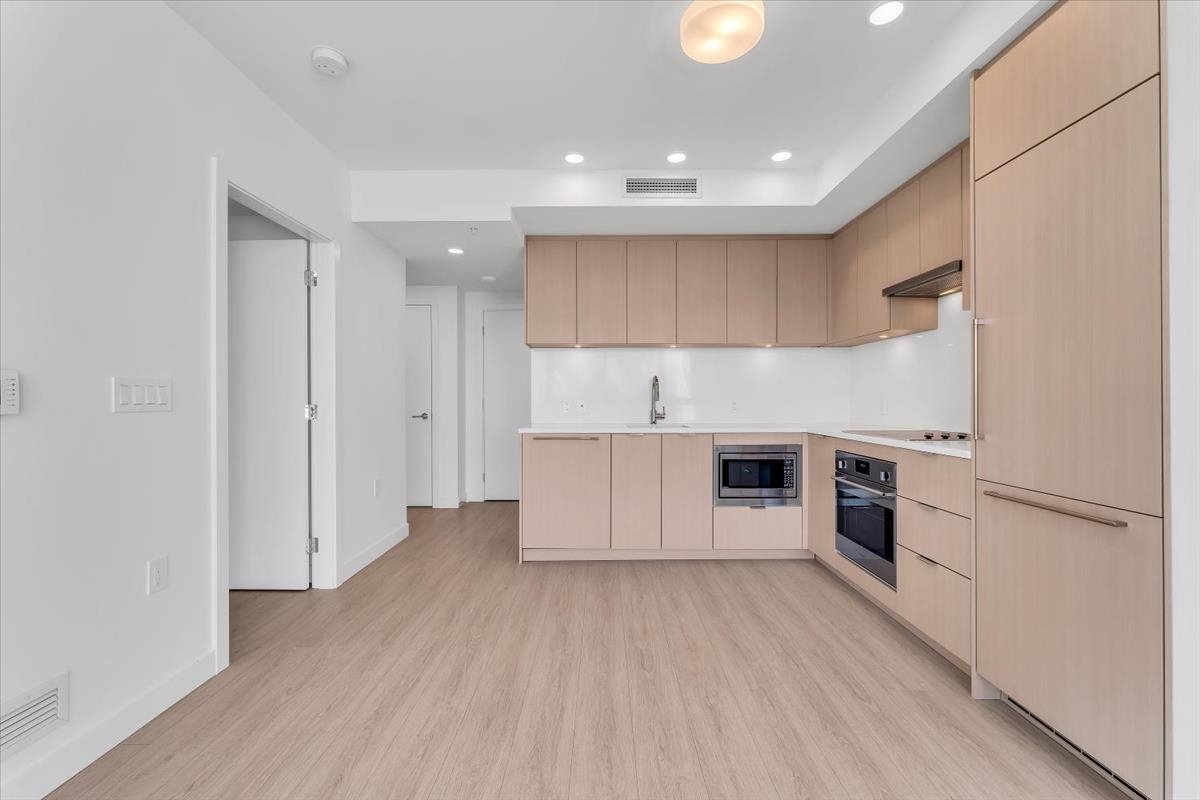 Living Room Photo of 1212 13675 107a Avenue, Surrey, BC