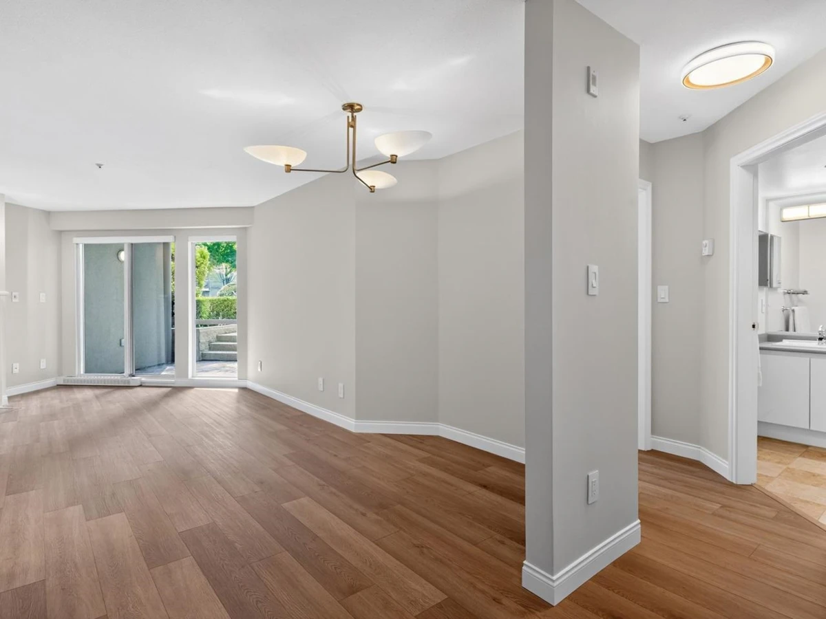 Living Room Photo of 109 8460 Jellicoe Street, Vancouver, BC