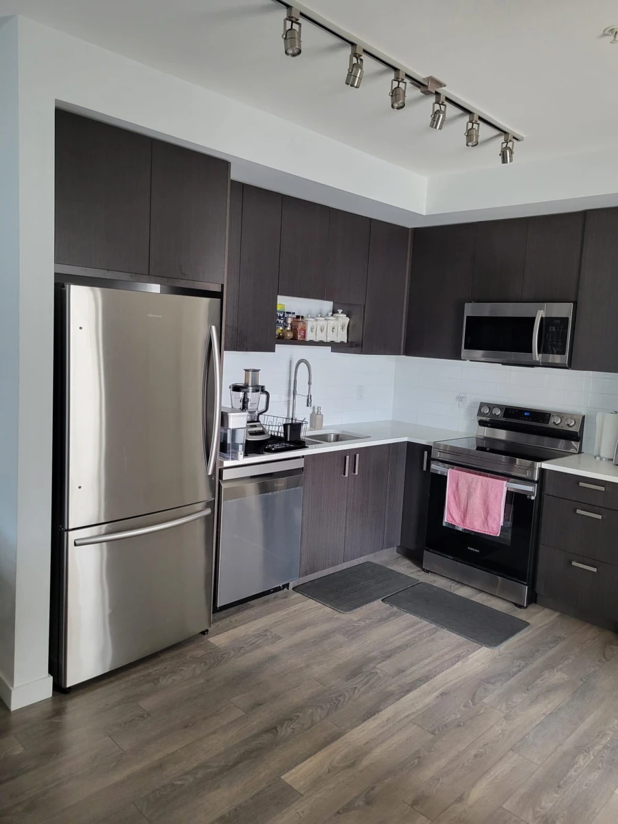 Living Room Photo of 319 13623 81a Avenue, Surrey, BC