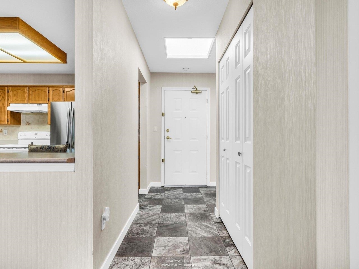 Living Room Photo of 312 5375 205 Street, Langley, BC