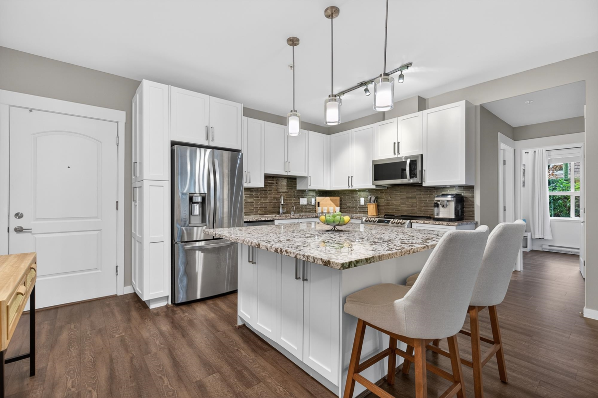 Living Room Photo of B102 6490 194 Street, Surrey, BC