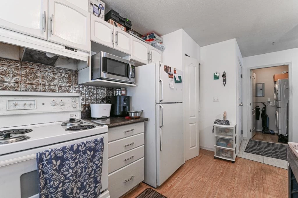 Family Room Photo of 208 2960 Trethewey Street, Abbotsford, BC